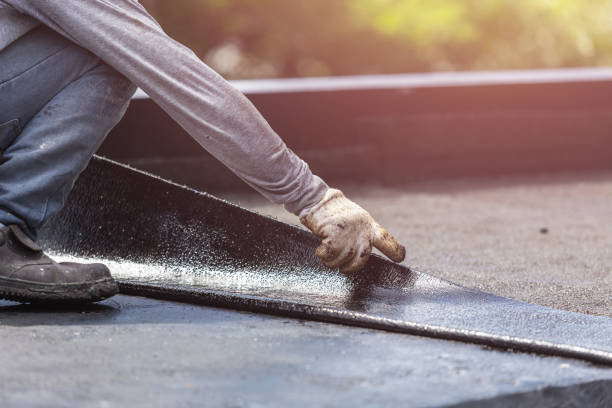 Professional Waterproofing technician working in Malcolm, AL